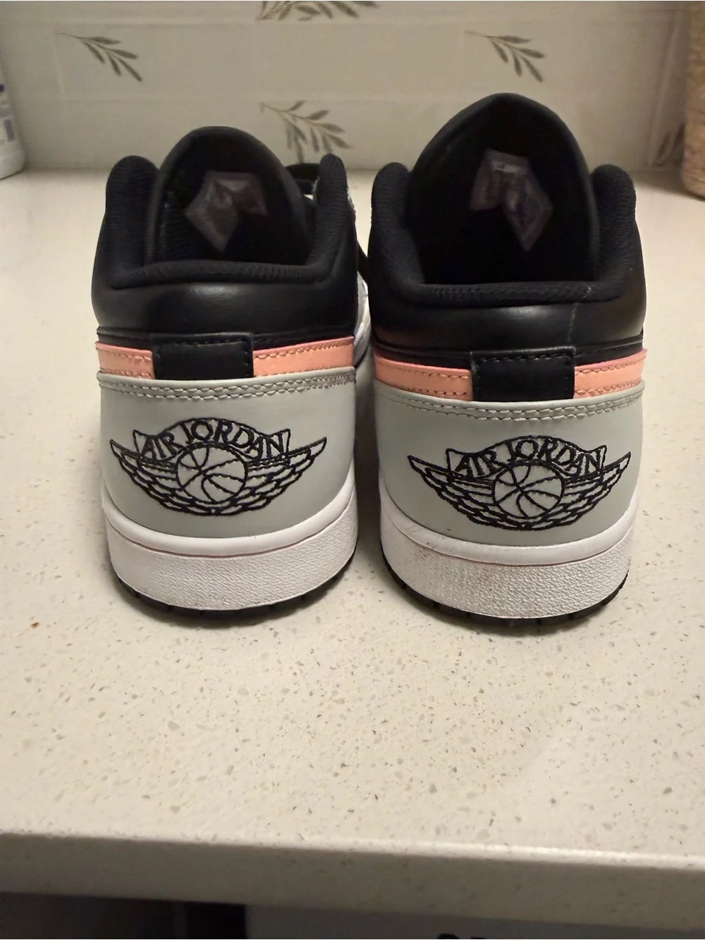 Jordan 1 Low Top Sneakers in Black, White & Peach